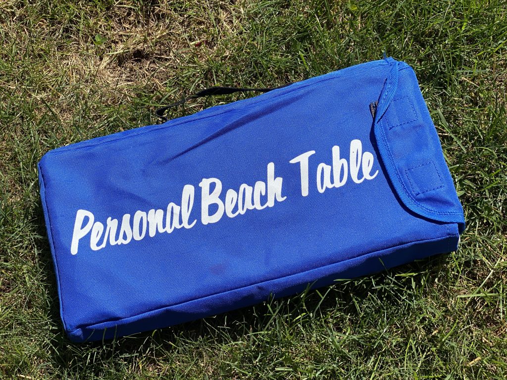 This personal beach table is great for decorating or for eating.