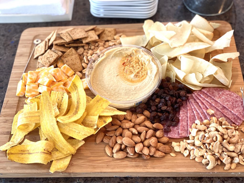 Charcuterie board with Caribbean snacks
